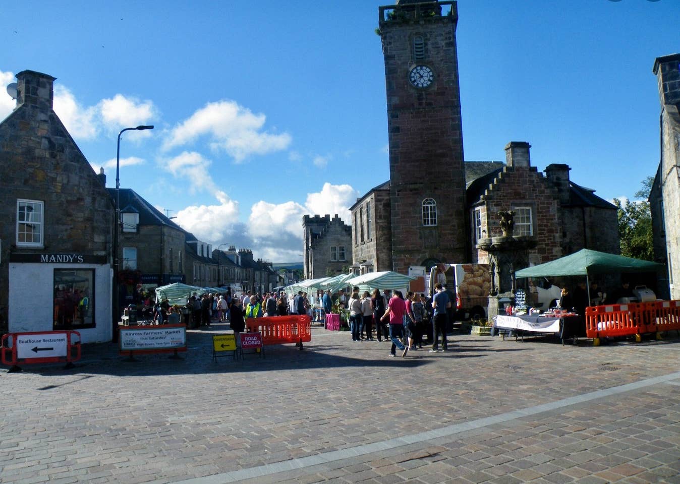 Kinross farmers market in the High Street below the town hall clock tower
