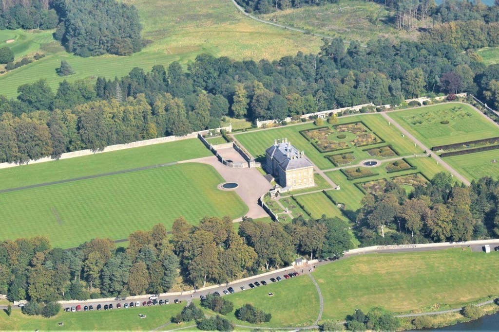 Aerial view of Kinross House and its formal gardens on the shore of Loch Leven